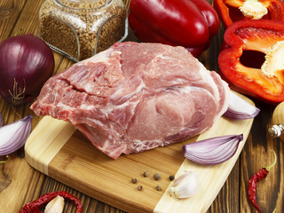 raw pork with vegetables and spices