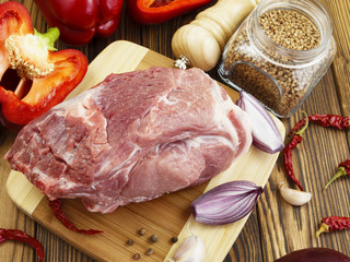 raw pork with vegetables and spices