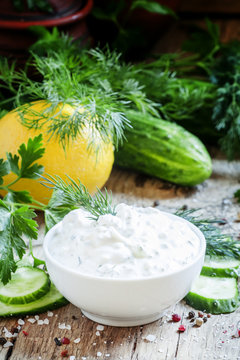 Ranch Sauce In A White Porcelain Bowl With Vegetables, Herbs And