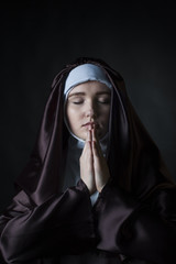 portrait of young beautiful woman nun