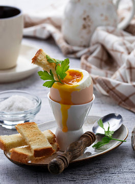 Soft-boiled egg and toasts