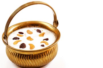 Indian Rice pudding payasam decorated with Cashews and raisin