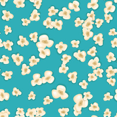 Heap popcorn for movie lies on blue background.