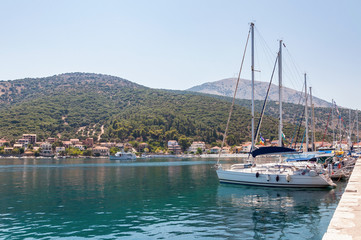 Fototapeta na wymiar Yachts in Agia Effimia port on Kefalonia