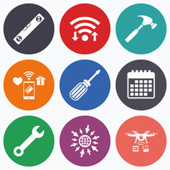 Screwdriver and bubble level, hammer.