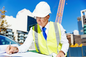 Engineer builder at construction site
