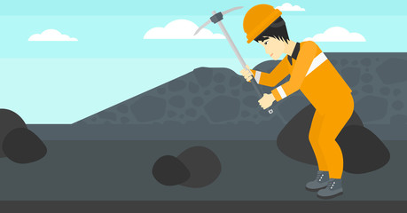 Miner working with pick.