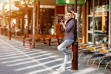 Male photographer taking picture