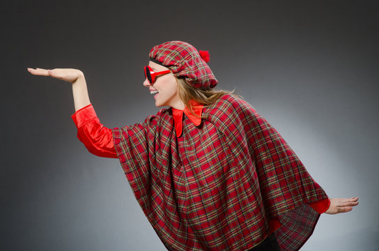 Woman wearing traditional scottish clothing
