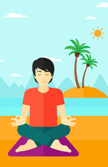 Man meditating in lotus pose.