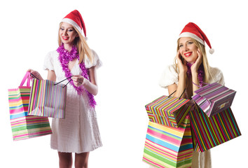 Woman with shopping bags isolated on white