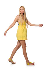 Caucasian fair model in yellow summer dress isolated on white