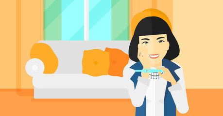 Woman with pregnancy test.