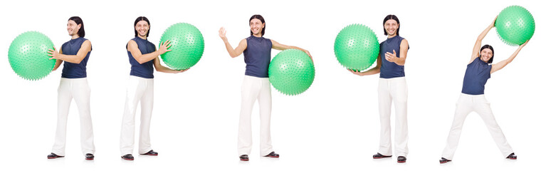 Fototapeta premium Man with swiss ball isolated on white