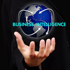 Businessman hand show business intelligence concept on virtual s