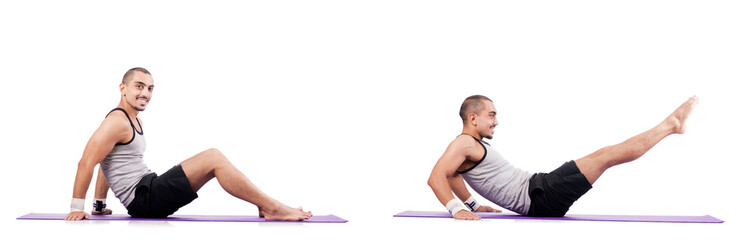 Fototapeta premium Man doing exercises on white
