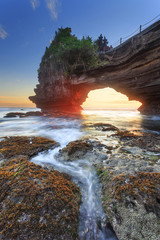 Fototapeta na wymiar Sunset at Pura Batu Bolong, Tanah Lot, Bali, Indonesia.