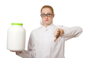 Young female doctor holding jar of protein isolated on white