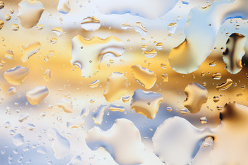 Drops of water on a color background. Shallow depth of field. Se