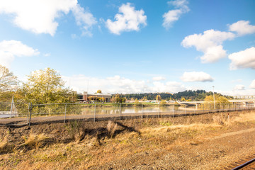 landscape of river near railway in blue sky