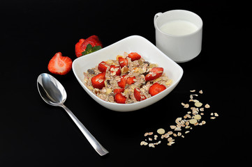 Oat muesli with strawberries and milk