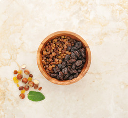 raisins in a wooden dish