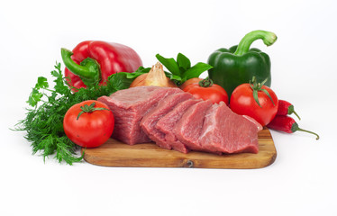 Sliced fresh piece of beef with vegetables