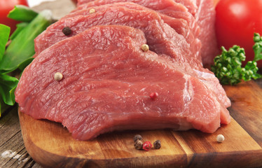 fresh raw meat with vegetables