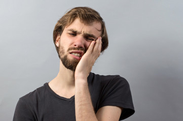 man with toothache