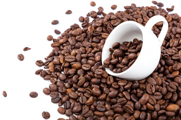 Coffee beans in a white cup