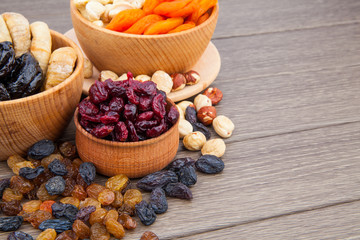 Dried fruits in wooden bowl