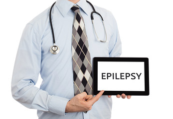 Doctor holding tablet - Epilepsy