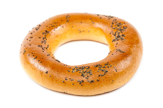 Bagel with poppy seeds on white