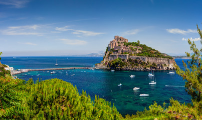 Aragon castle. Hieron I of Syracuse built the fortress in 474 B.C. In 1441 Alfonso of Aragon, rebuilt the old Castle, linking to the main island by the stone bridge. Ischia island, Italy. © Yevgen Belich