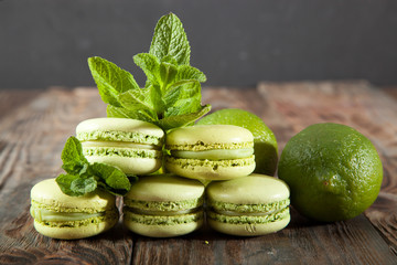 St Patricks Day green macarons with shamrock flags and leprechaun hat