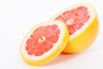 slices of  grapefruit on white background