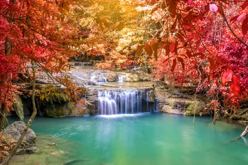 Foto op Plexiglas Waterfall in Deep forest at Erawan waterfall National Park © CasanoWa Stutio