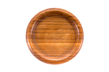 A round hand craft wooden saucer, wooden bottom plate isolated o