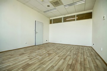 Empty room with single door