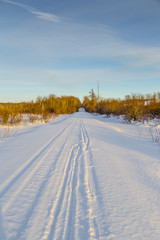 Obraz premium Rural Snowshoe Pathway