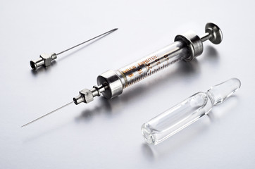 Vintage insulin syringe with insulin vial