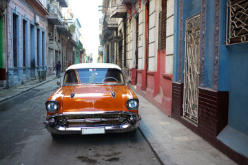Beautiful old american car in deserted Havana street