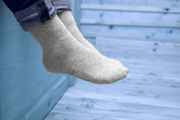 female legs in woolen socks