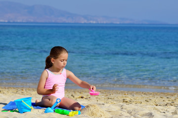 Real toddler girl enjoying her summer vacation