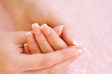 Woman hands with beautiful french manicure