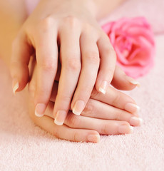 Naklejka premium Closeup image of pink french manicure