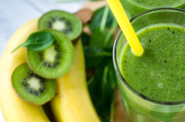 Fresh and healthy green smoothie  with spinach,banana, kiwi
