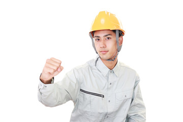 ガッツポーズの労働者