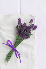 nice bundle of lavender on pink wooden table