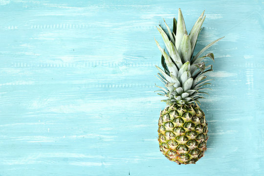 Pineapple on a blue pastel background